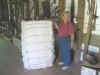 Gloria is checking out a 400 pound cotton bale